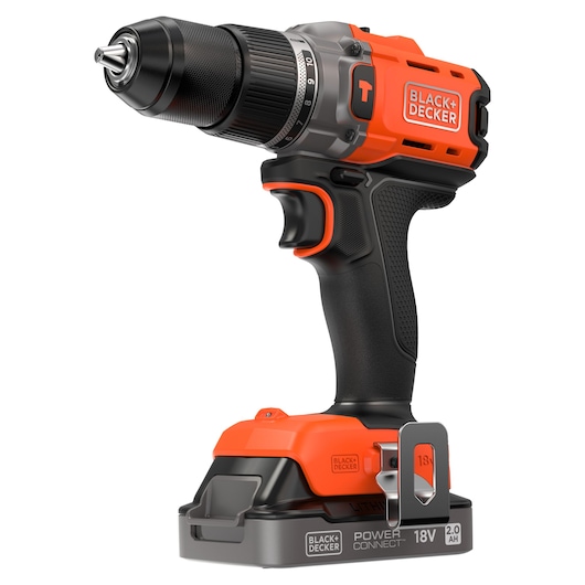 Cordless BLACK+DECKER drill with 18V battery, orange and black, standing upright on a white background.