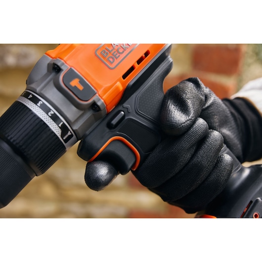 The variable trigger and ergonomic handle of the BLACK+DECKER® POWERCONNECT™ 18V Cordless Hammer Drill.
