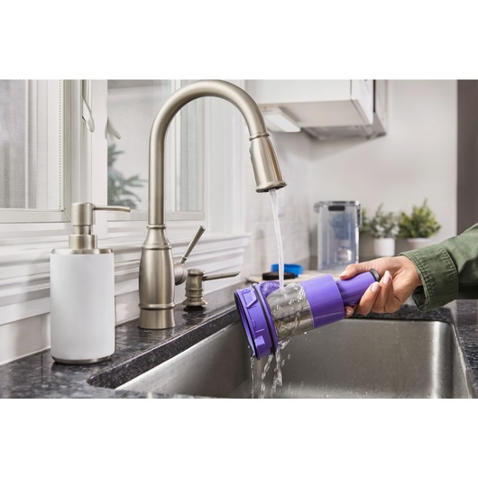 BLACK+DECKER SUMMITSERIES cordless stick vacuum filter being washed
